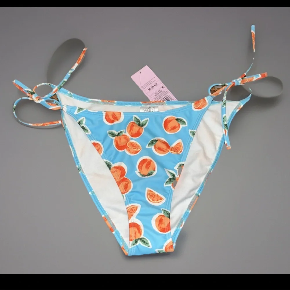 Wild Fable Women's Side-Tie Low-Rise Cheeky High Leg Bikini Bottom -W/Oranges
